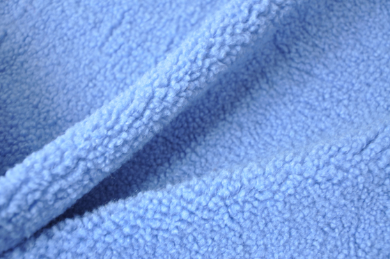 O poliéster 100% azul do sherpa do falso ou com lãs 150cm CW ou a urdidura ajustável fez malha a tela reciclada