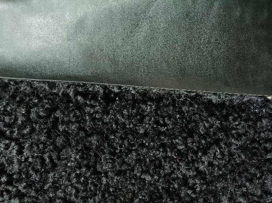 Couro composto de lã de cordeiro preto e encaracolado